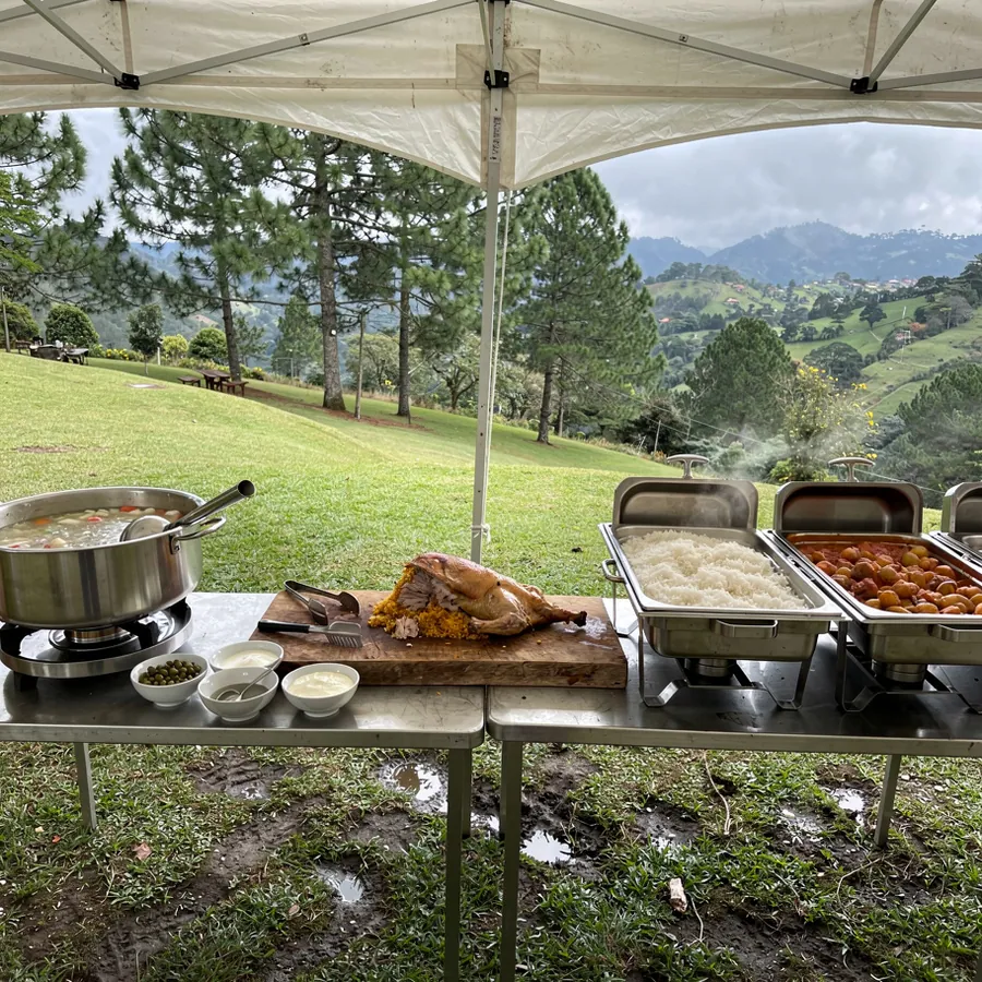 Buffet under white tent at Llanogrande finca