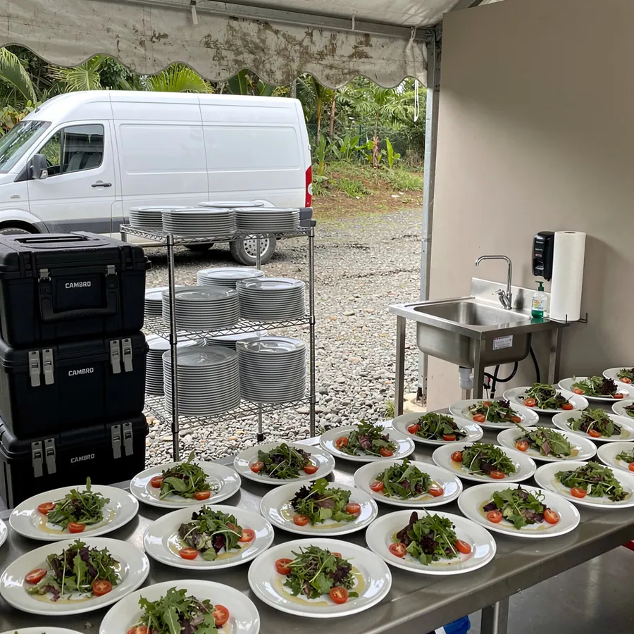 Catering prep tent behind event venue