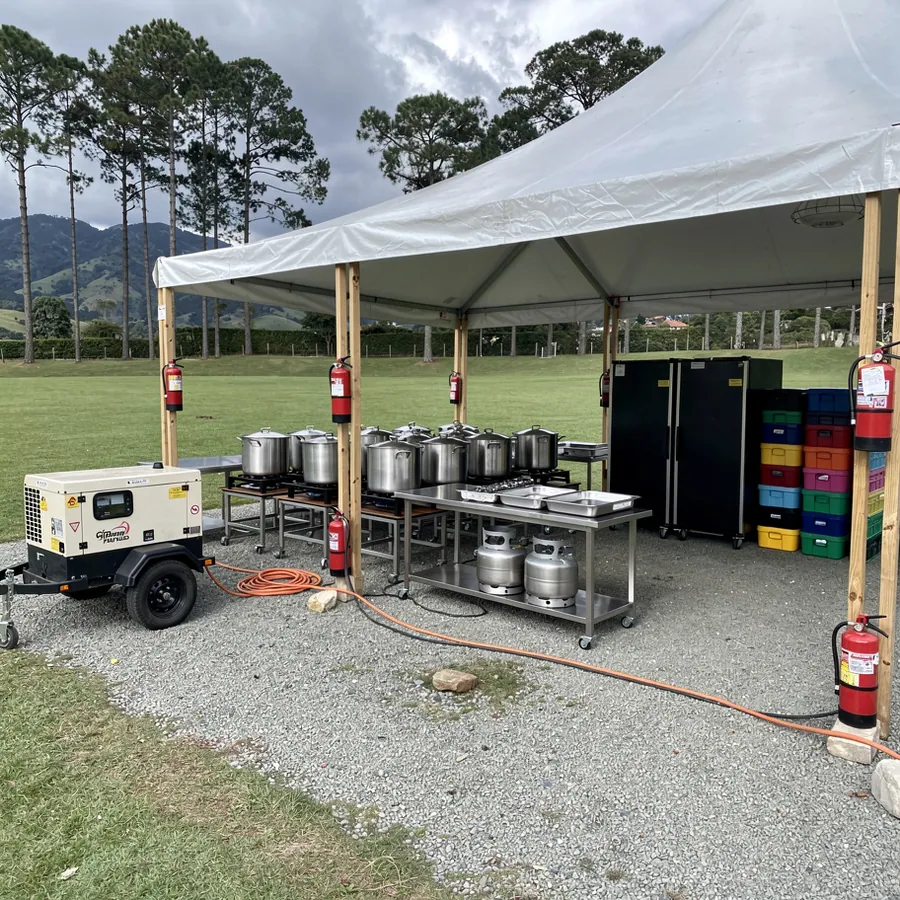 Field kitchen tent with generator setup