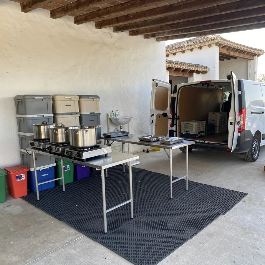 Mobile catering kitchen behind venue terrace